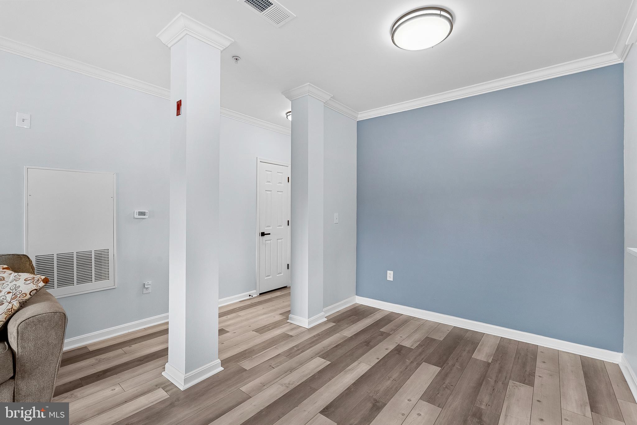4551 Strutfield Lane, Unit 4111 Alexandria, VA 22311 - Photo 12 of 35 a view of empty room with wooden floor