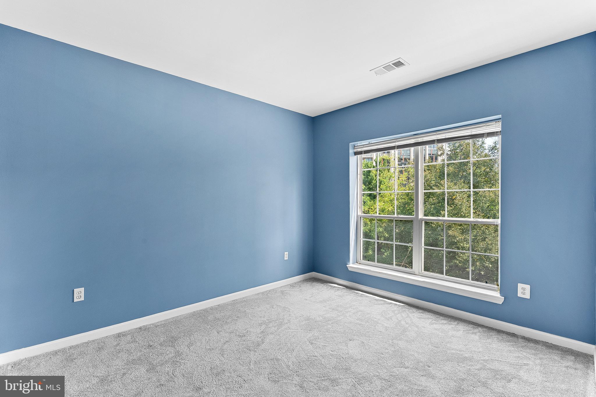 4551 Strutfield Lane, Unit 4111 Alexandria, VA 22311 - Photo 23 of 35 a view of an empty room with a window