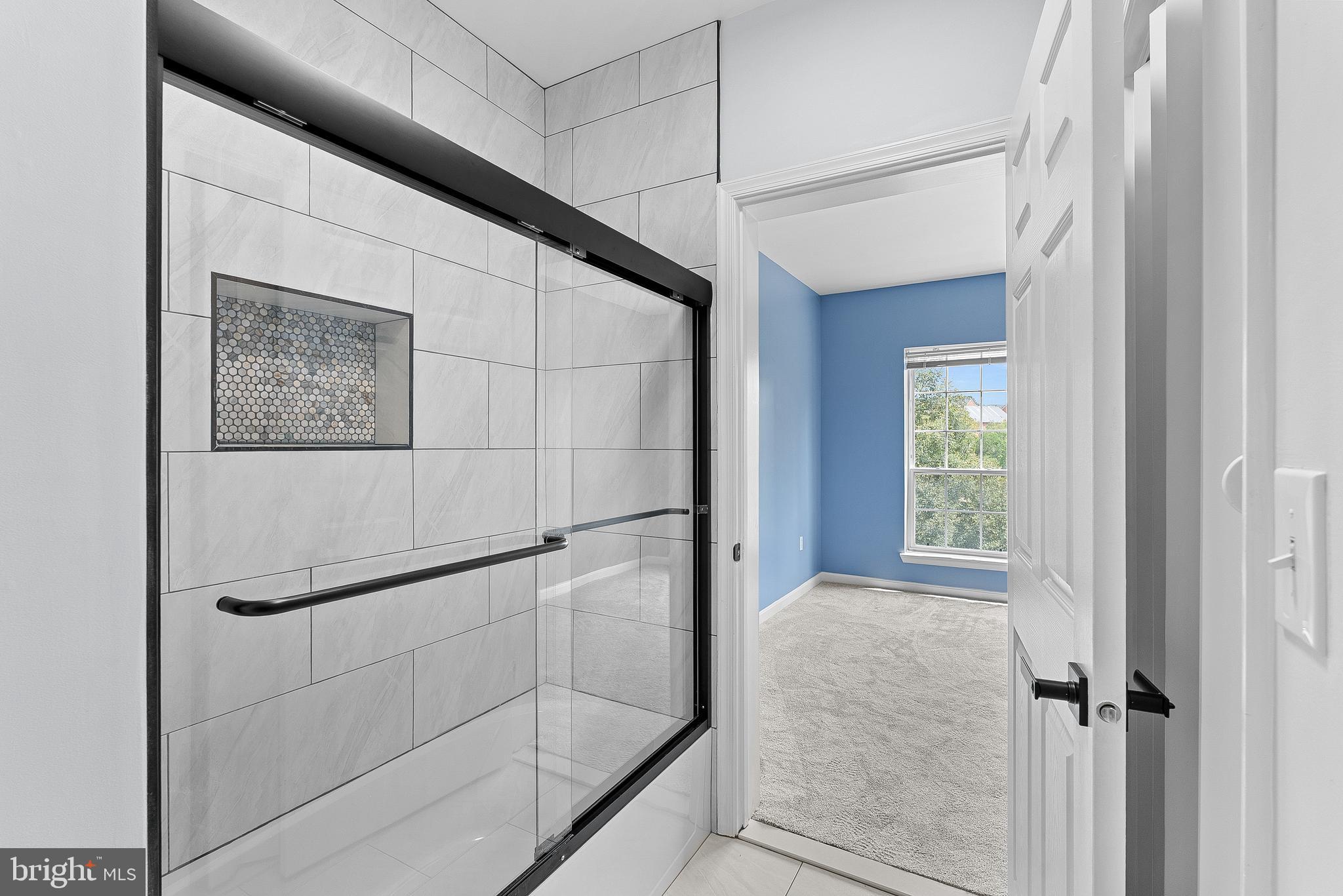 4551 Strutfield Lane, Unit 4111 Alexandria, VA 22311 - Photo 27 of 35 a bathroom with a shower