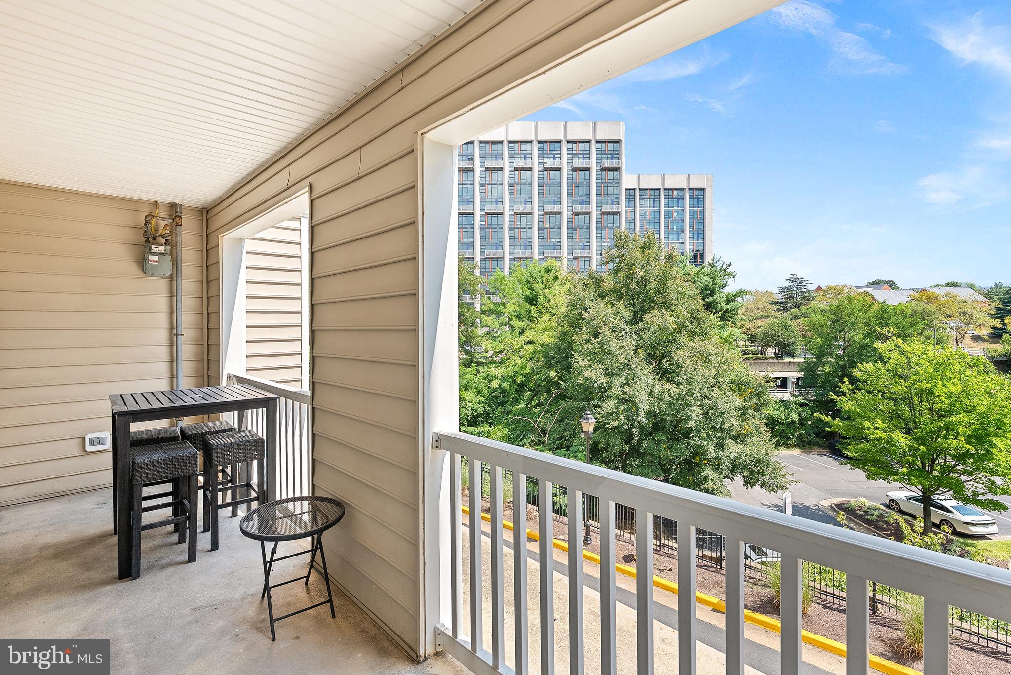 4551 Strutfield Lane, Unit 4111 Alexandria, VA 22311 - Photo 29 of 35 a view of a balcony with chairs