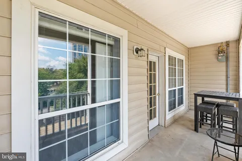 a view of livingroom with furniture and windows