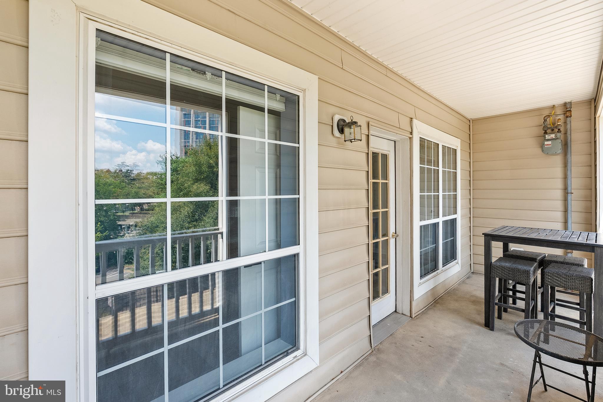 4551 Strutfield Lane, Unit 4111 Alexandria, VA 22311 - Photo 30 of 35 a view of livingroom with furniture and windows
