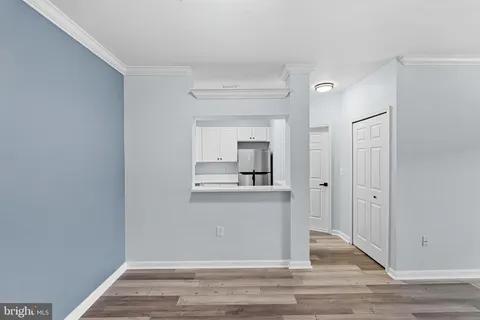 a view of a kitchen from the hallway