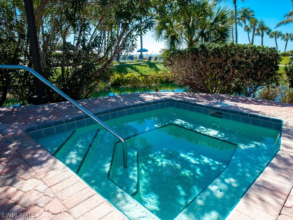 2445 West Gulf Drive, Unit E2 Sanibel, FL 33957 - Photo 32 of 35 a view of a lake