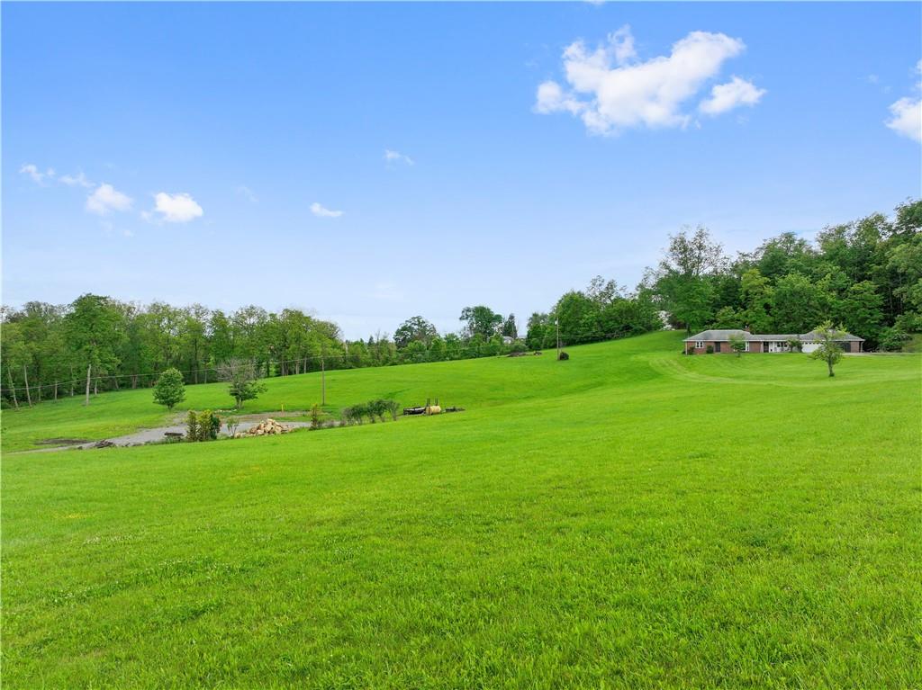 884 Linden Road Eighty Four, PA 15330 - Photo 4 of 47 There is an all-brick ranch already on the land...