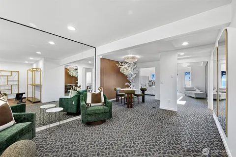 a living room with furniture and a table