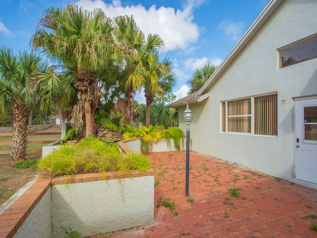 167 Deer Run Road Palm Bay, FL 32909 - Photo 28 of 35 a view of outdoor space and yard