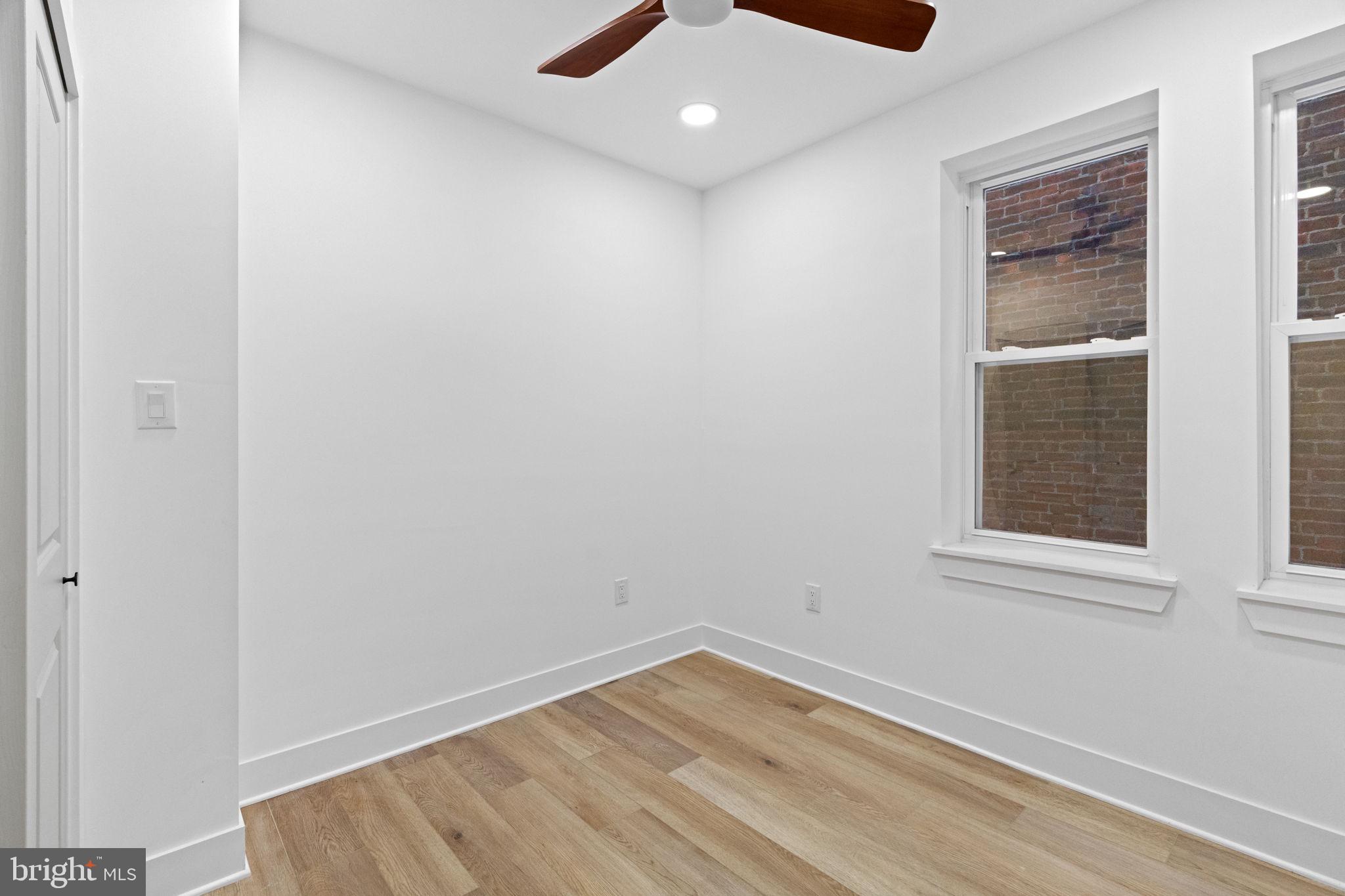 1502 South 52nd Street Philadelphia, PA 19143 - Photo 10 of 34 an empty room with a window