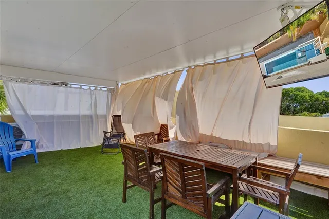 a view of a chairs in a patio