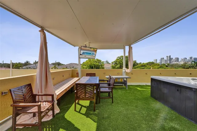 a view of a field with ocean view