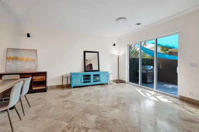 a room with a sink and a mirror