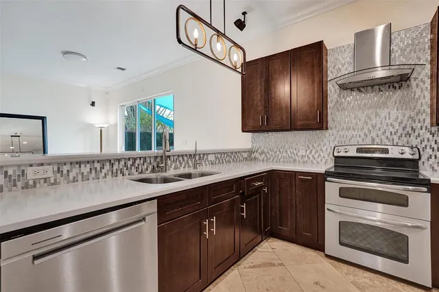 a kitchen with appliances and cabinets