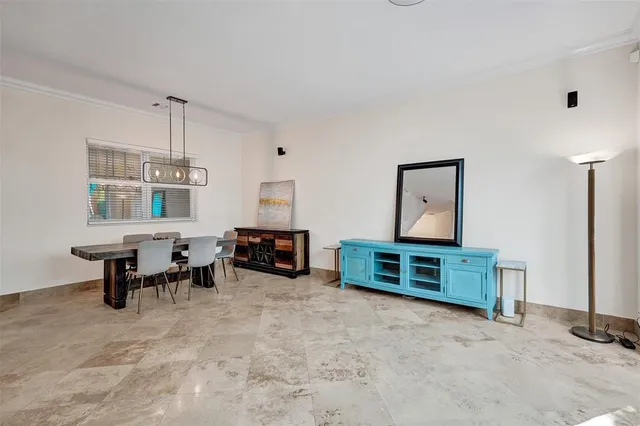 a view of a livingroom with furniture and window