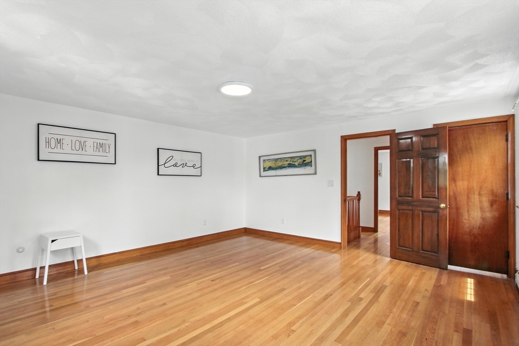 106 Home Park Road Braintree, MA 02184 - Photo 19 of 37 a view of empty room with wooden floor