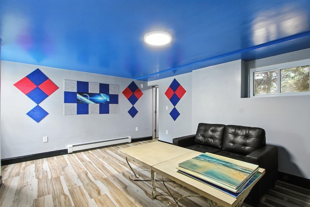 106 Home Park Road Braintree, MA 02184 - Photo 27 of 37 a room with furniture and air hockey table