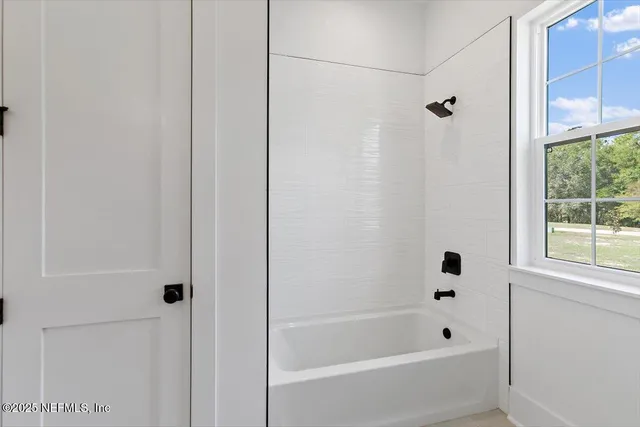 a bathroom with a bathtub