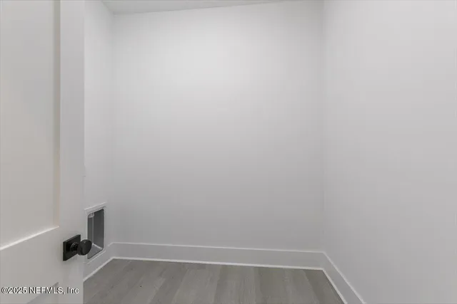 a view of an empty walk in closet