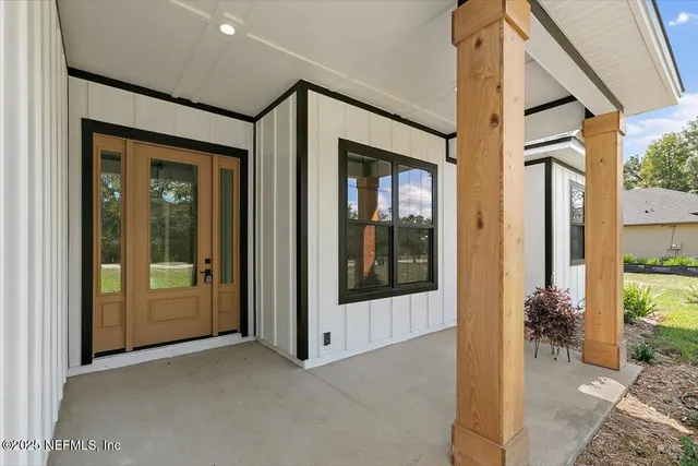 a view of a entryway door front of house