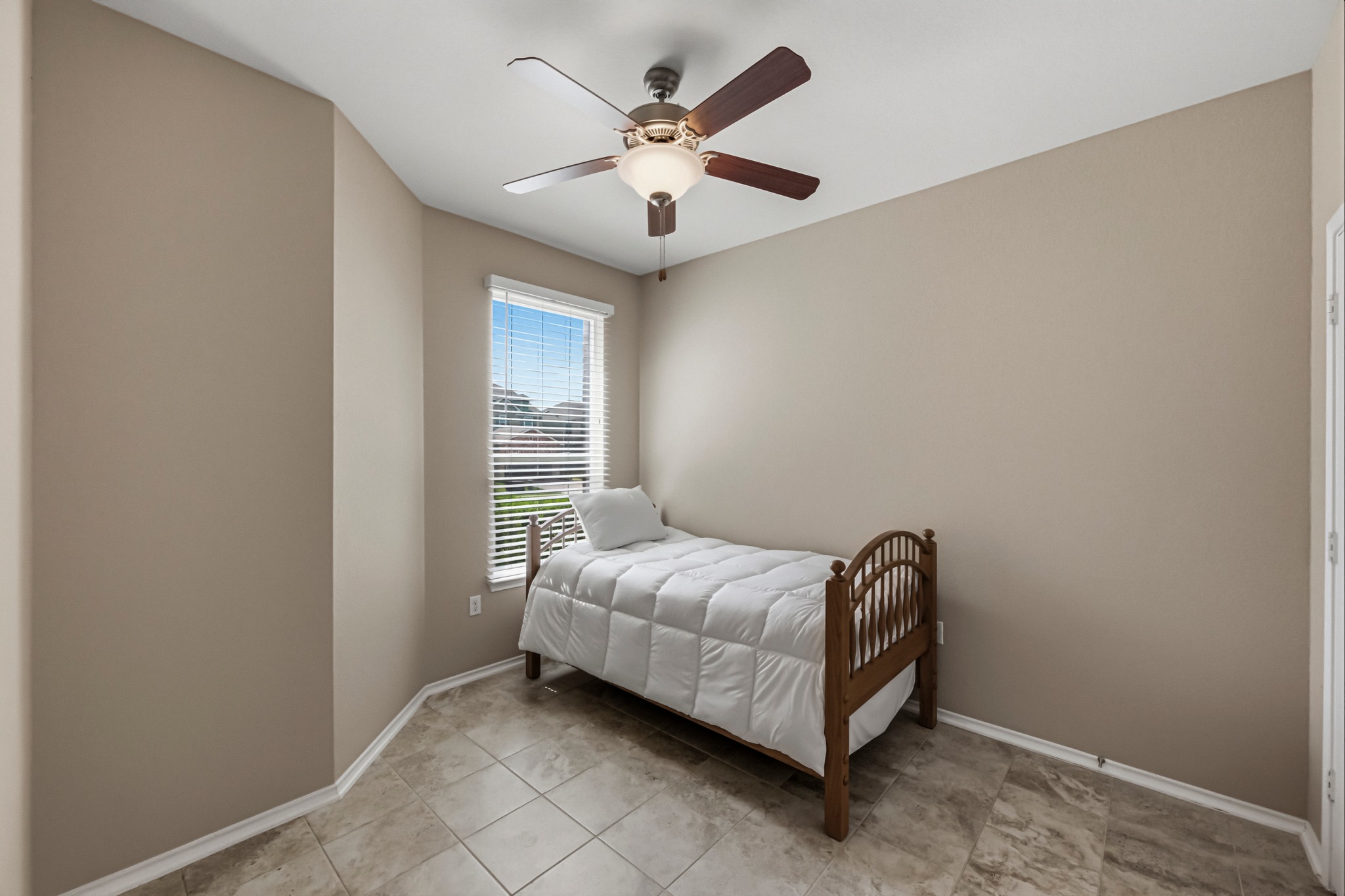 14620 Goshawk Drive Pflugerville, TX 78660 - Photo 16 of 24 a room with a bed and window