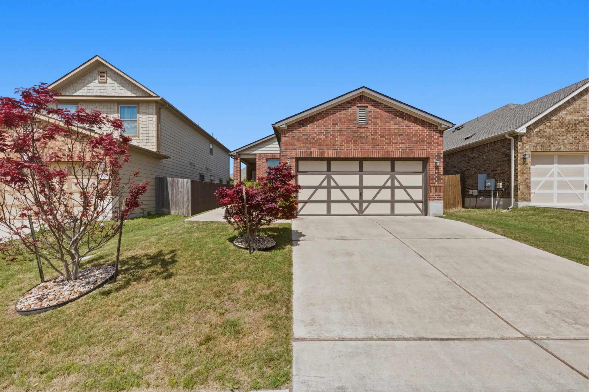 14620 Goshawk Drive Pflugerville, TX 78660 - Photo 2 of 24 a view of a house with a yard