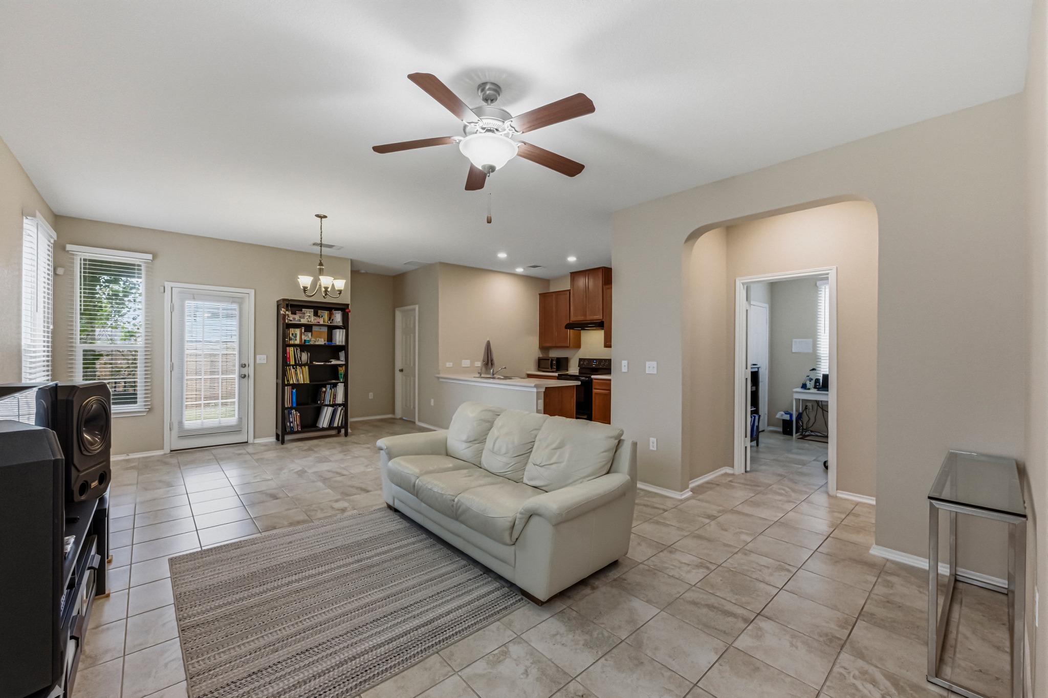 14620 Goshawk Drive Pflugerville, TX 78660 - Photo 4 of 24 a living room with furniture and wooden floor