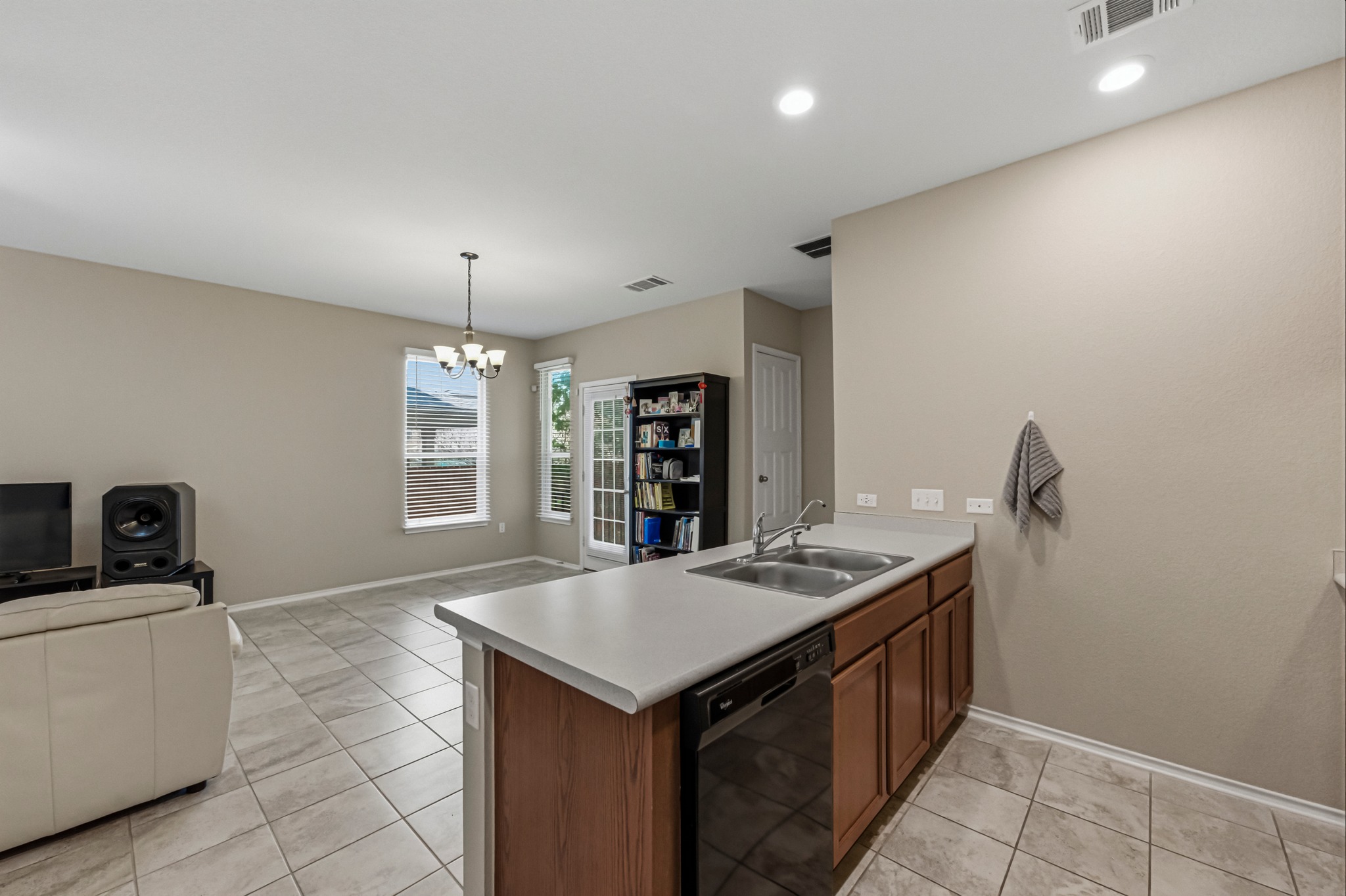 14620 Goshawk Drive Pflugerville, TX 78660 - Photo 24 of 24 a kitchen that has a lot of cabinets in it