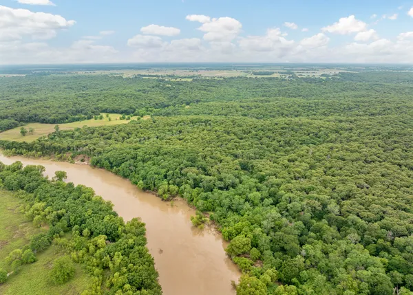a view of a lake with a city