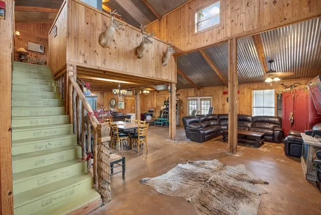 a view of a chairs and table in a patio