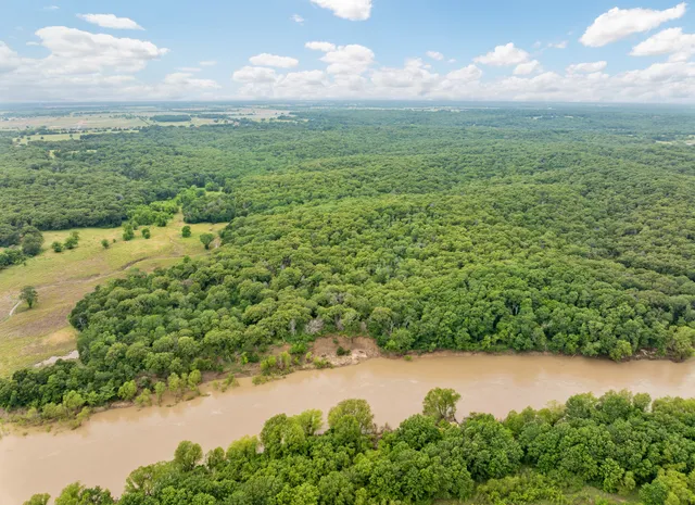 a view of a lake with a city