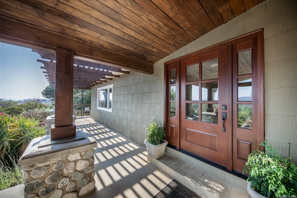 14956 Fruitvale Road Valley Center, CA 92082 - Photo 2 of 25 Gorgeous mahogany front doors welcome you.