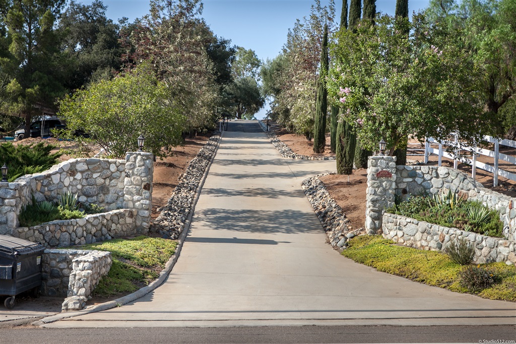 14956 Fruitvale Road Valley Center, CA 92082 - Photo 15 of 25 Beautiful stone front gated driveway.