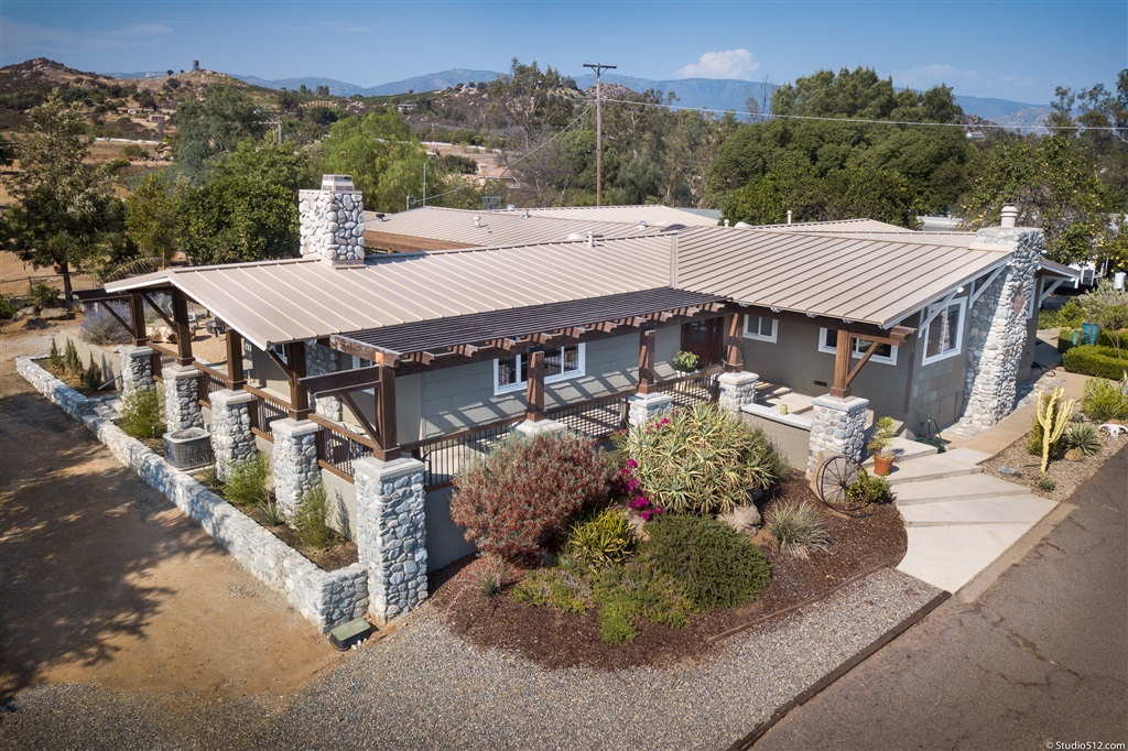 14956 Fruitvale Road Valley Center, CA 92082 - Photo 17 of 25 Beautiful newer metal roofing adds to charm of Craftsman style facade.