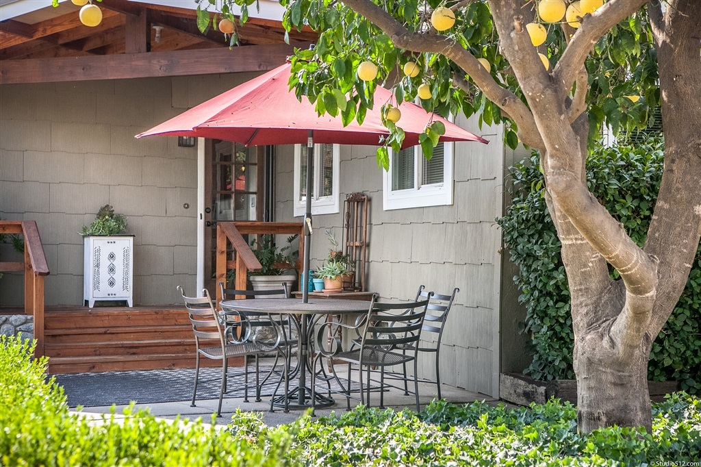 14956 Fruitvale Road Valley Center, CA 92082 - Photo 23 of 25 Cozy outdoor patio off kitchen. Great for BBQing... one of the many areas you'll love about this home.