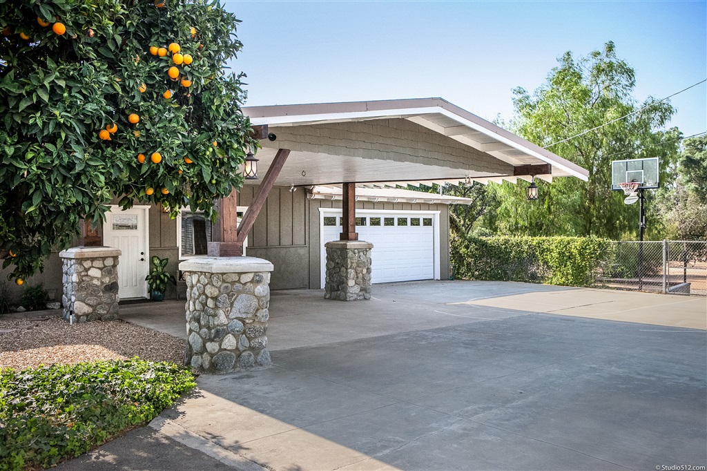 14956 Fruitvale Road Valley Center, CA 92082 - Photo 24 of 25 Covered driveway and two car garage offer plenty of parking options.