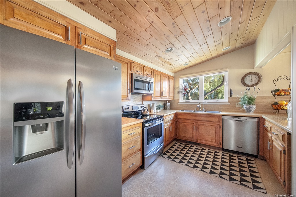 14956 Fruitvale Road Valley Center, CA 92082 - Photo 7 of 25 Kitchen boasts stainless steel appliances.