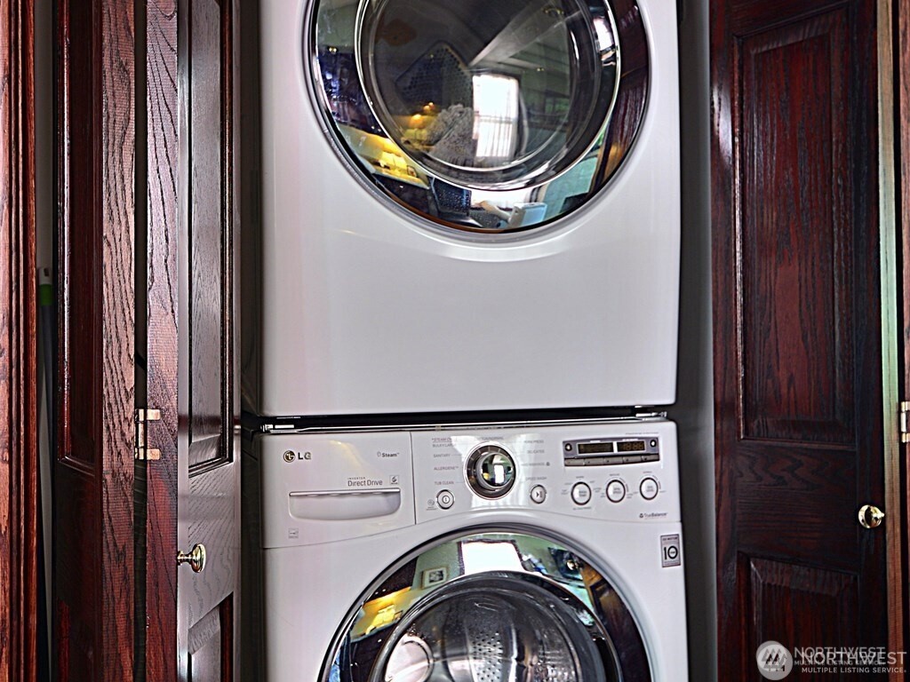 7842 Lake City Way Northeast Seattle, WA 98115 - Photo 17 of 36 a utility room with dryer and washer