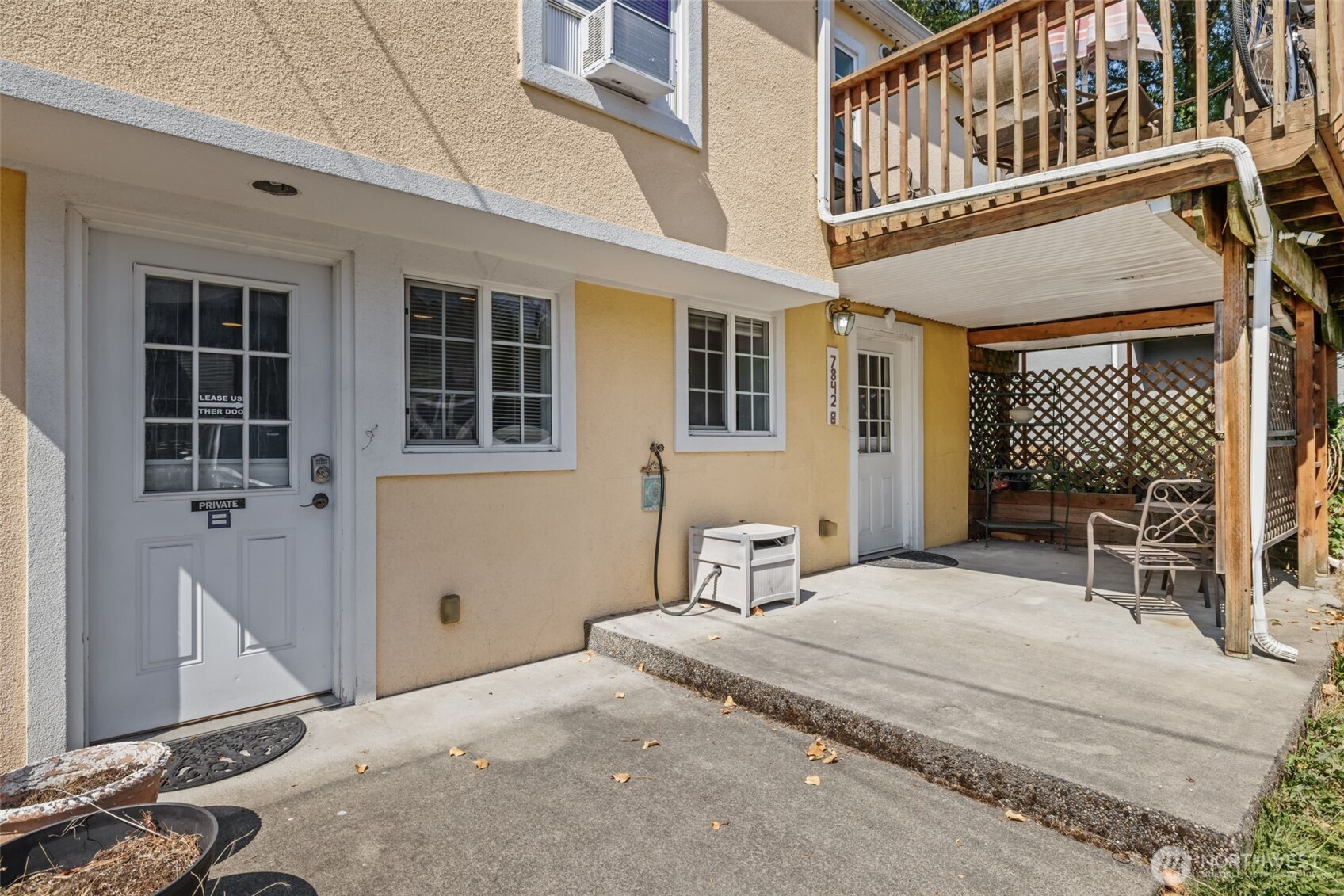 7842 Lake City Way Northeast Seattle, WA 98115 - Photo 19 of 36 a bedroom with a bed and a table and chair