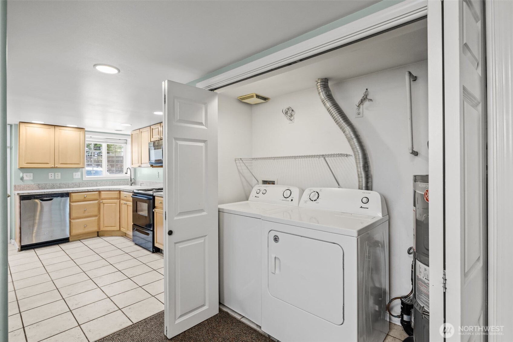 7842 Lake City Way Northeast Seattle, WA 98115 - Photo 26 of 36 a view of kitchen with washer and dryer
