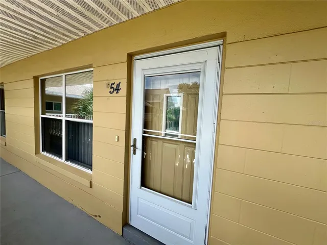 en empty room with windows