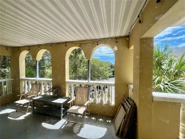 a view of a forest from a balcony