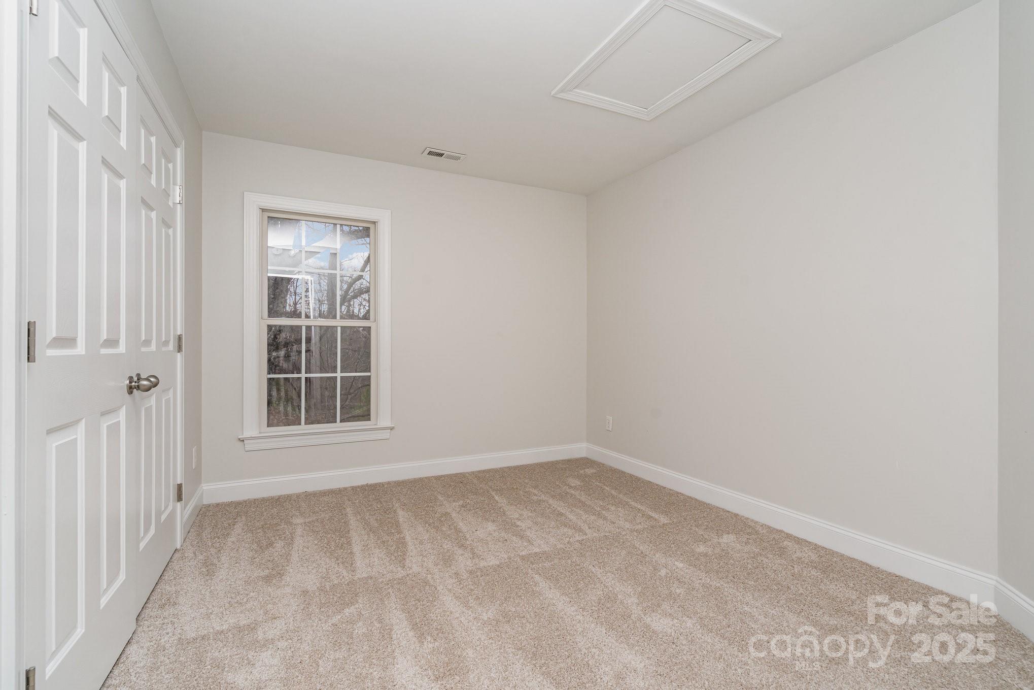 2615 Rolling Ridge Drive Hickory, NC 28602 - Photo 20 of 29 an empty room with windows