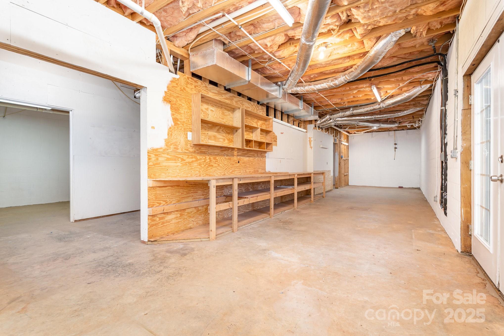 2615 Rolling Ridge Drive Hickory, NC 28602 - Photo 24 of 29 an empty room with wooden door and windows