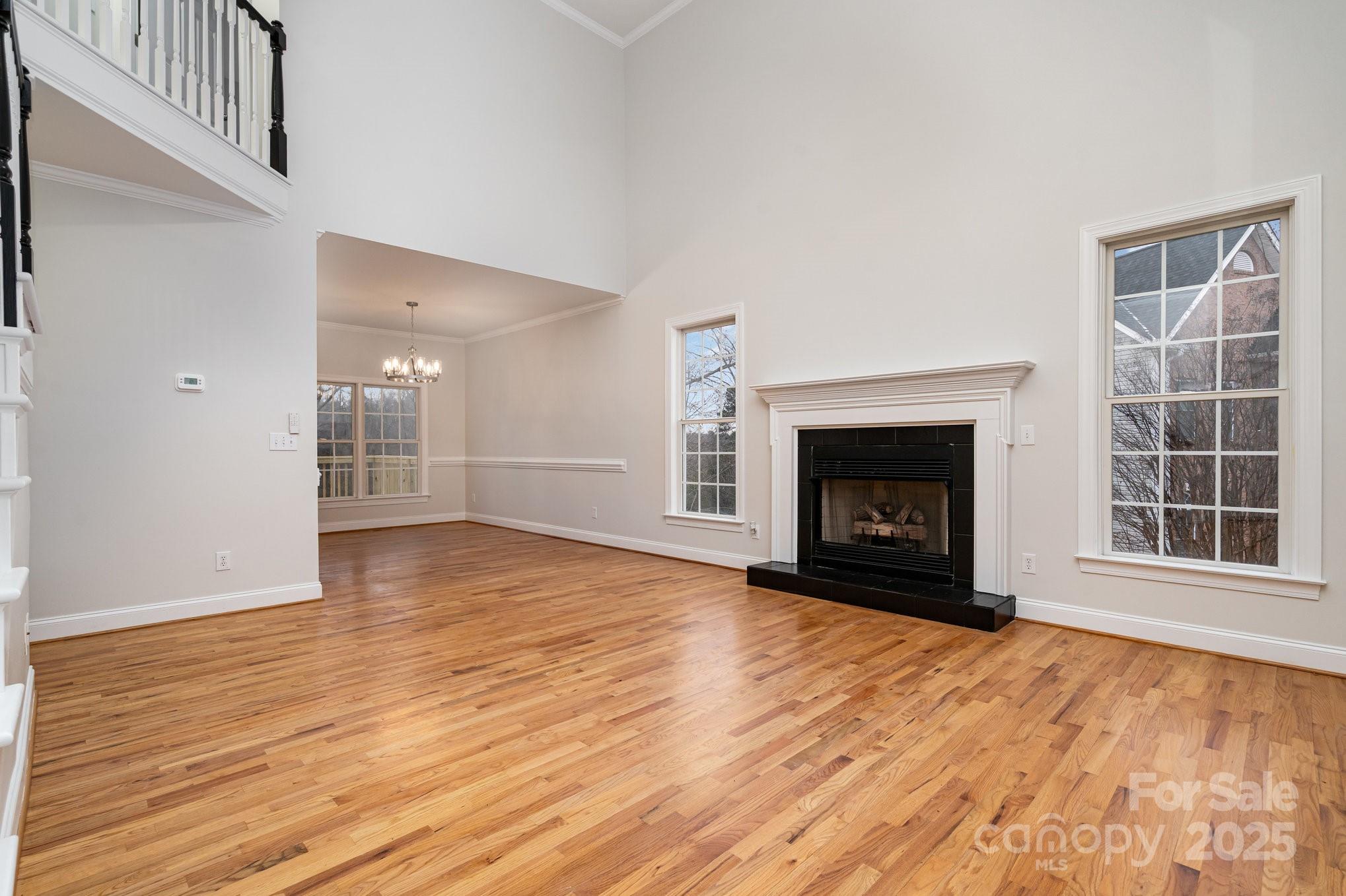 2615 Rolling Ridge Drive Hickory, NC 28602 - Photo 6 of 29 a view of empty room with wooden floor and fireplace