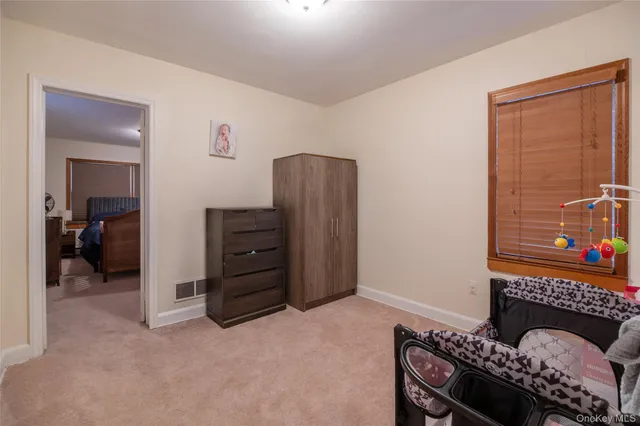 a bedroom with a bed and furniture