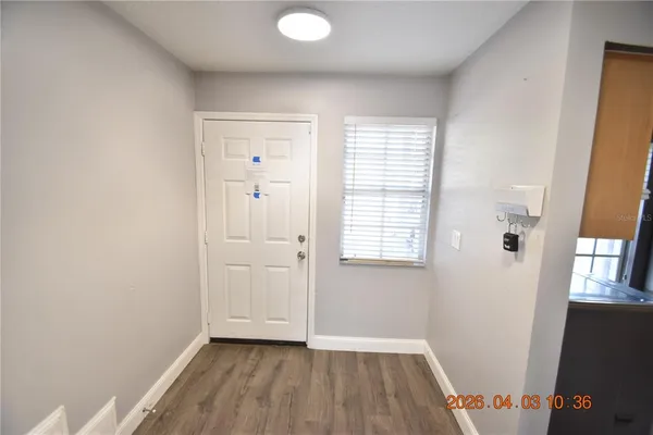 a view of a house with outdoor space and sitting area