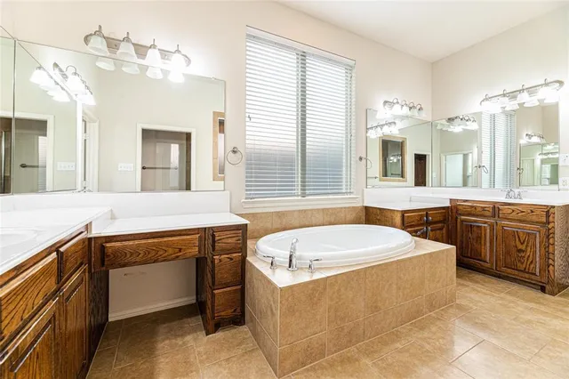 a view of a room with wooden floor and white walls