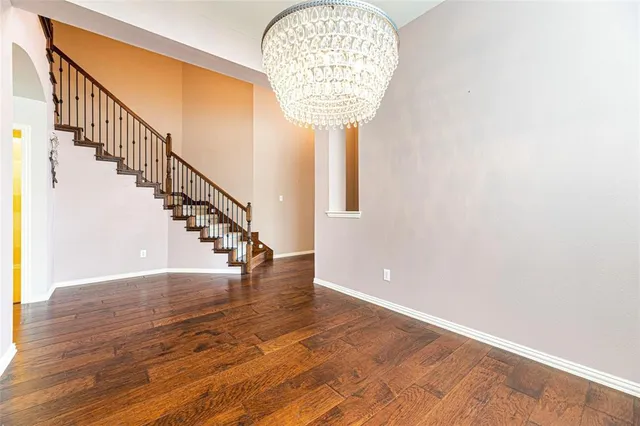 a view of entryway with wooden floor