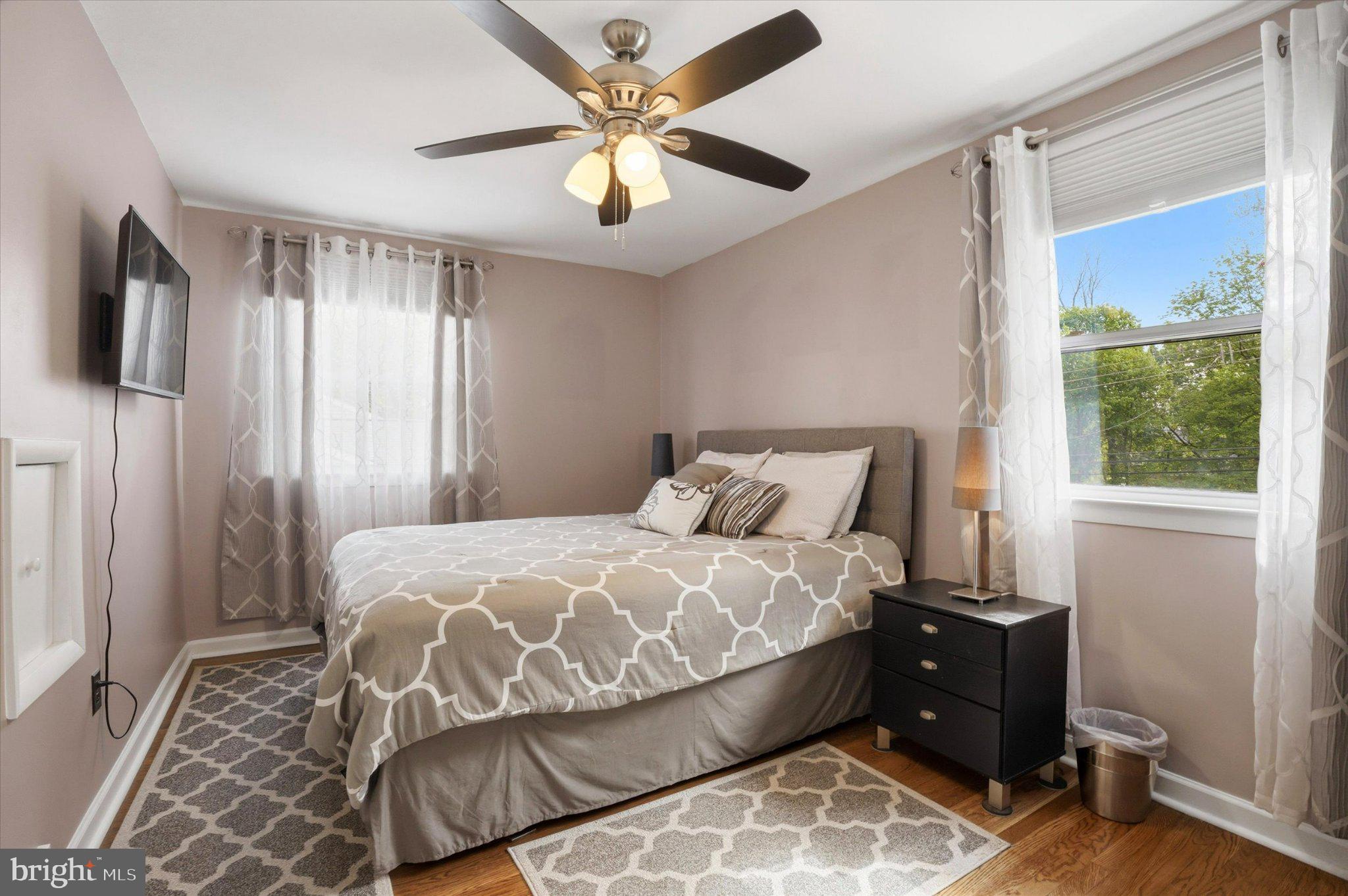 308 Lewis Road Springfield, PA 19064 - Photo 15 of 34 Serene bedroom with natural light.