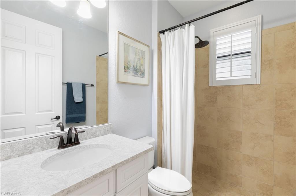 2862 Aviamar Circle Naples, FL 34114 - Photo 26 of 48 Bathroom featuring a shower stall and vanity