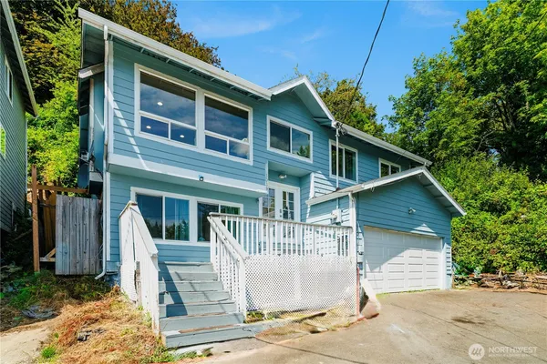 a front view of a house with a porch